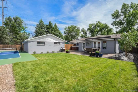 a view of a swimming pool with an outdoor space and seating area