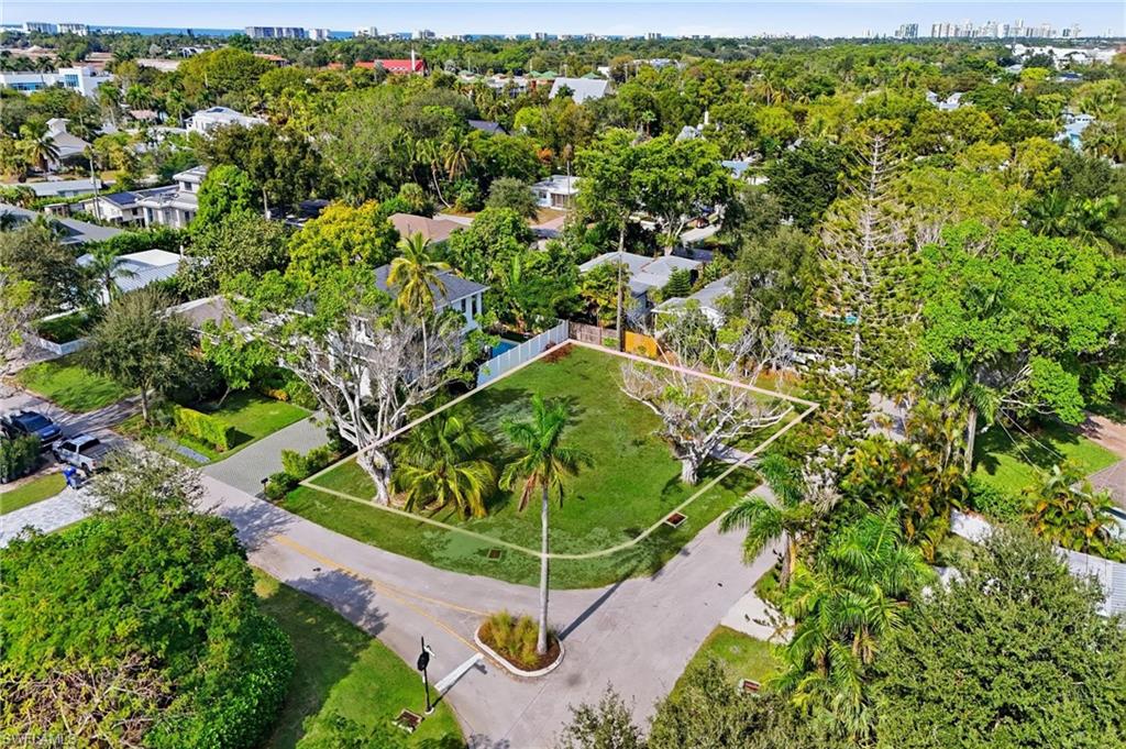 1165 8th Terrace North Naples, FL 34102 - Photo 3 of 11 an aerial view of a residential houses with outdoor space and street view