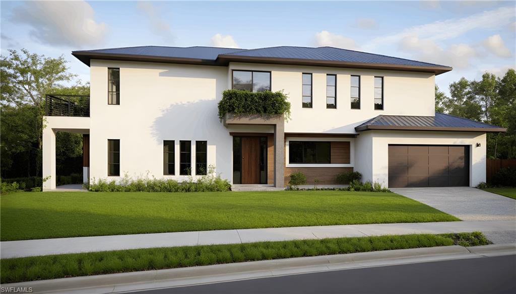 1165 8th Terrace North Naples, FL 34102 - Photo 10 of 11 a front view of a house with a yard and garage