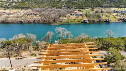 a view of a chairs and table in the patio