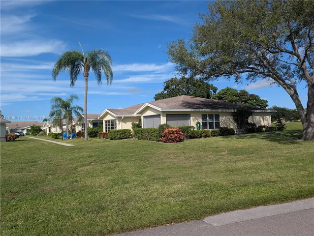 a view of a golf course with a garden