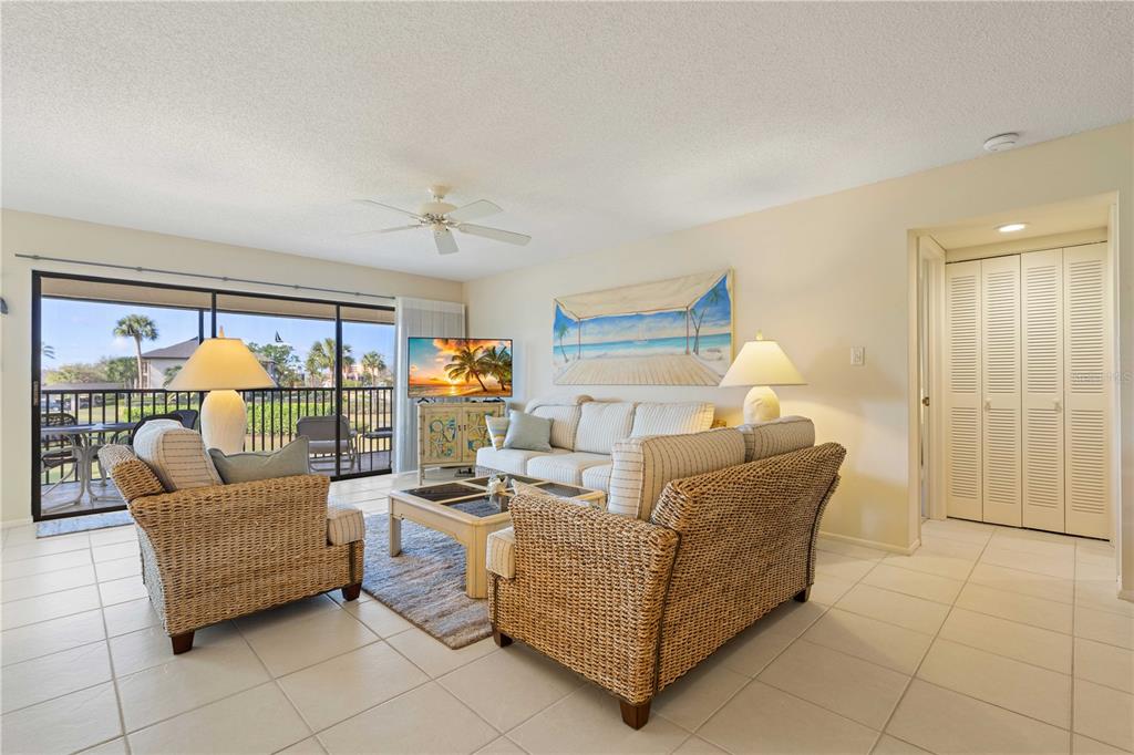 2 Pirates Lane, Unit 23B Punta Gorda, FL 33955 - Photo 25 of 70 a living room with furniture and a large window