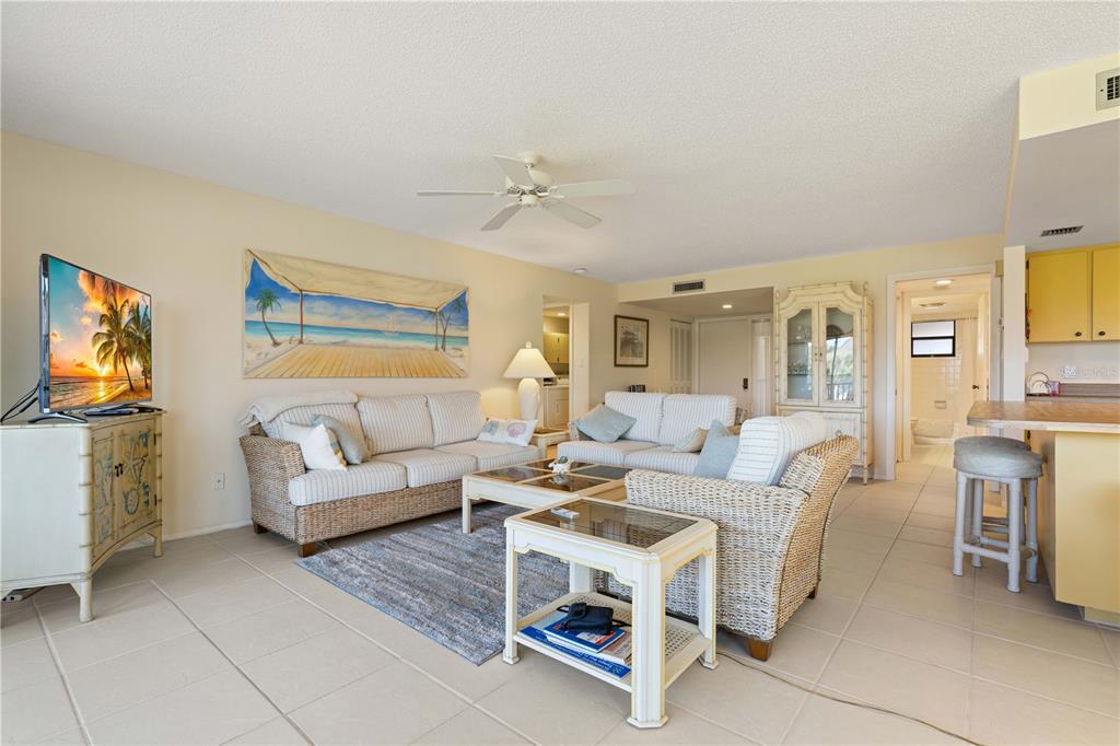 2 Pirates Lane, Unit 23B Punta Gorda, FL 33955 - Photo 26 of 70 a living room with furniture and a flat screen tv