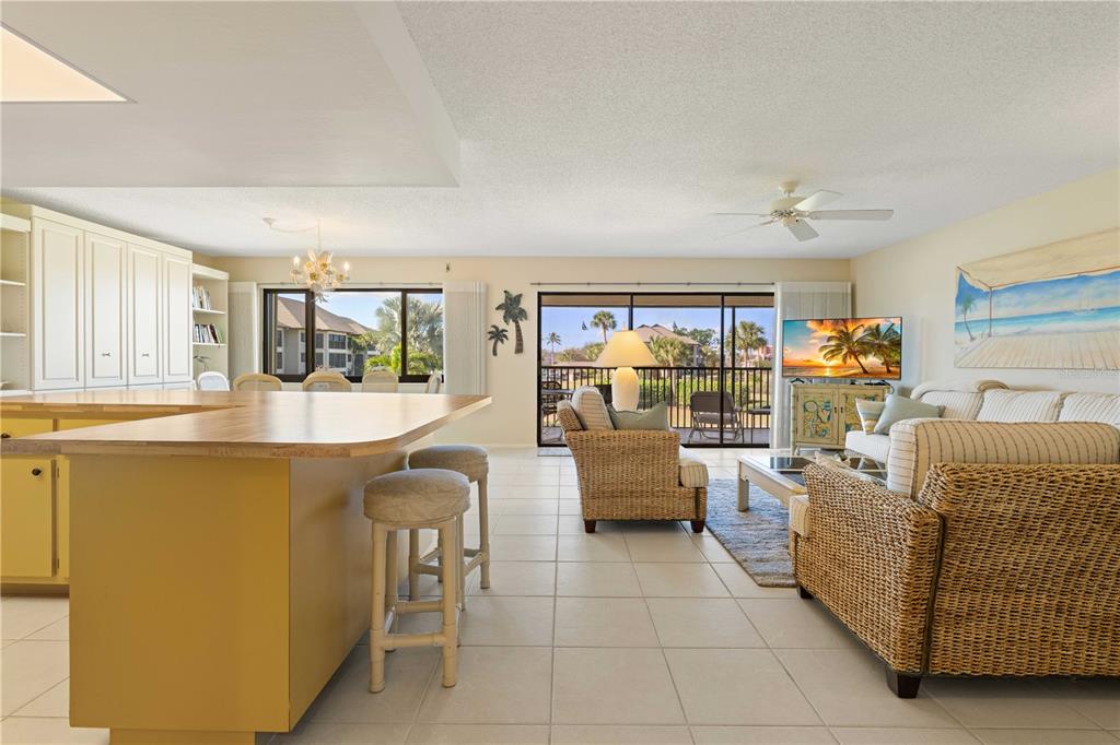 2 Pirates Lane, Unit 23B Punta Gorda, FL 33955 - Photo 30 of 70 a living room with furniture and a large window
