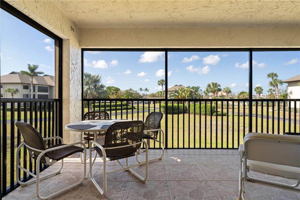 2 Pirates Lane, Unit 23B Punta Gorda, FL 33955 - Photo 37 of 70 a view of a chairs and table in patio
