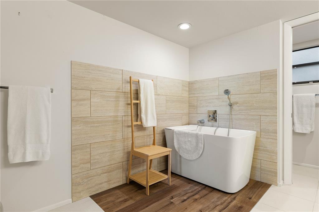 2 Pirates Lane, Unit 23B Punta Gorda, FL 33955 - Photo 42 of 70 a bathroom with a sink mirror toilet and bathtub