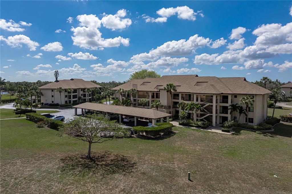 2 Pirates Lane, Unit 23B Punta Gorda, FL 33955 - Photo 64 of 70 a view of a house with backyard and sitting area