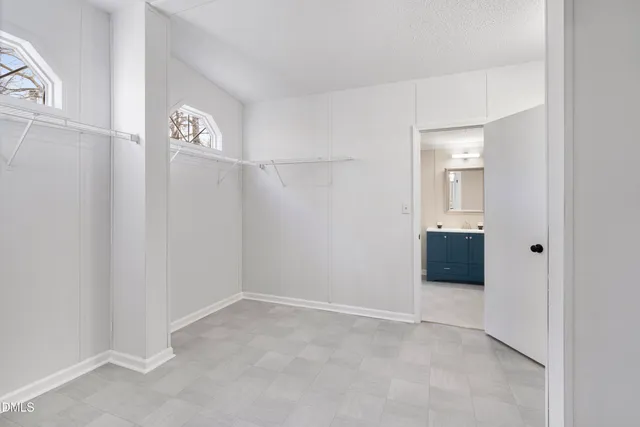 a bathroom with a sink toilet a mirror and vanity