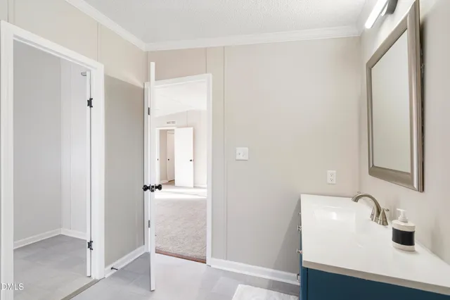 a white bath tub sitting in a bathroom