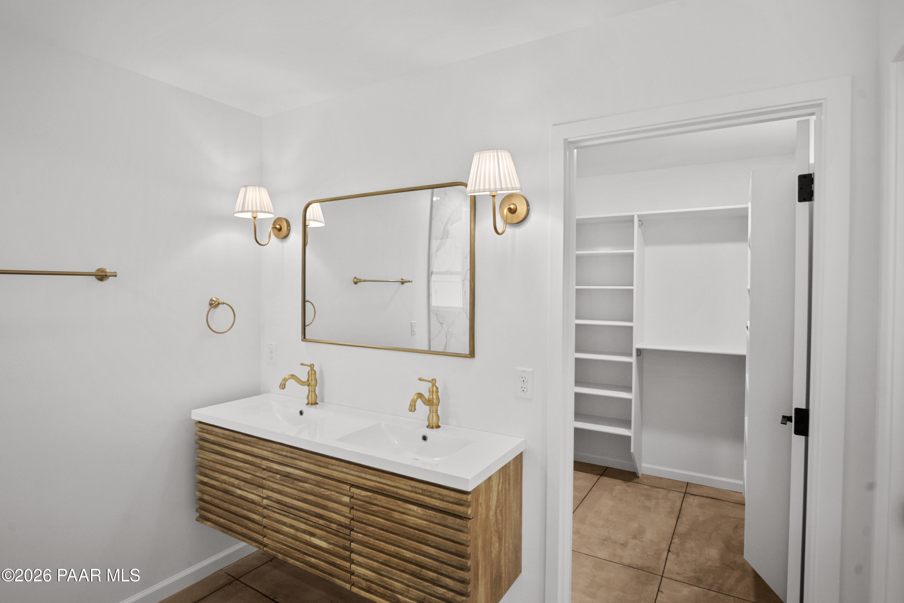 4920 East Amber Road Prescott, AZ 86301 - Photo 25 of 38 a bathroom with a sink and a mirror