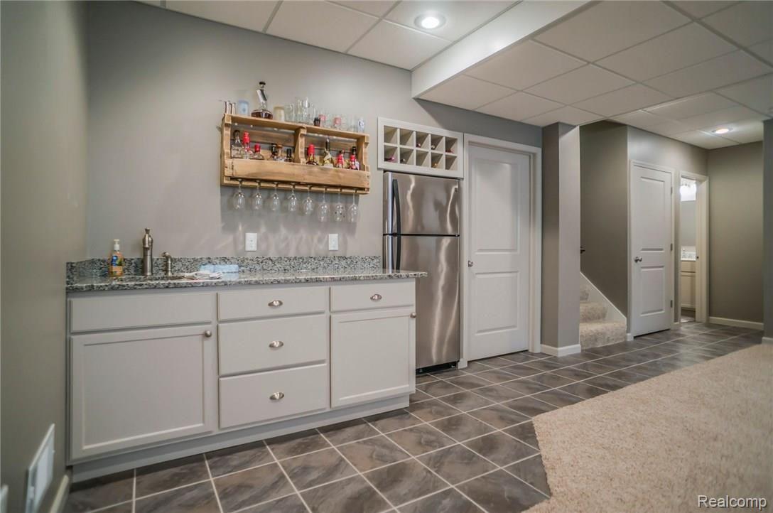 1193 Riverside Street Milford, MI 48381 - Photo 46 of 62 Wet bar, built-in wine rack.