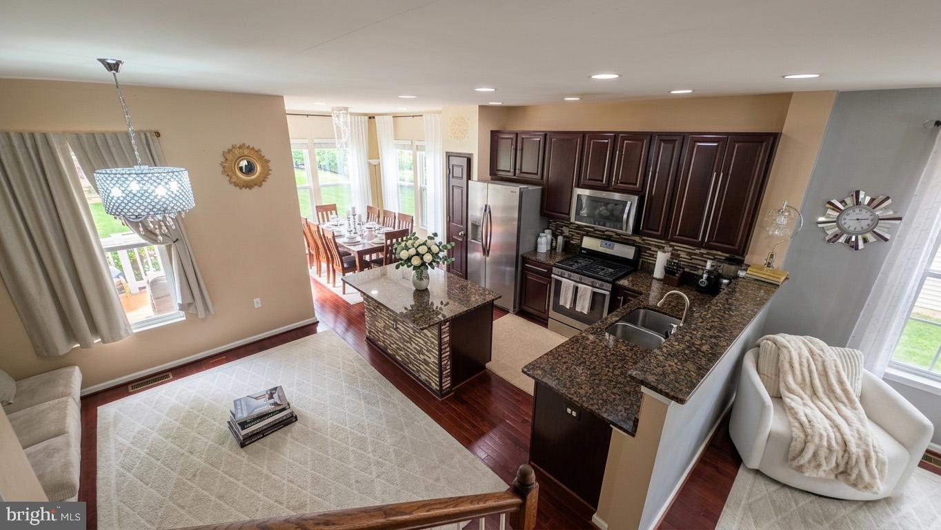 17143 Gibson Mill Road Dumfries, VA 22026 - Photo 16 of 35 Modern elegance in open living space.