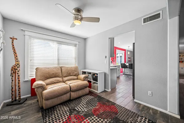 a kitchen with a sink and a large window