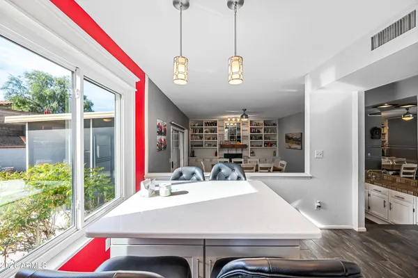a bathroom with a sink a mirror and toilet