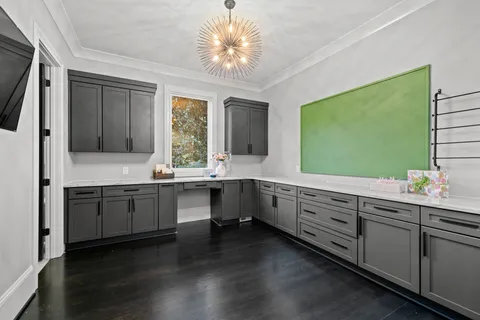 a large kitchen with a large window