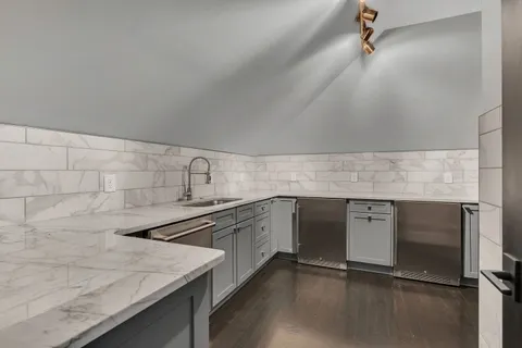 a kitchen with a stove and a microwave