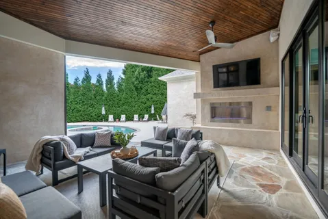 a view of a swimming pool in back yard