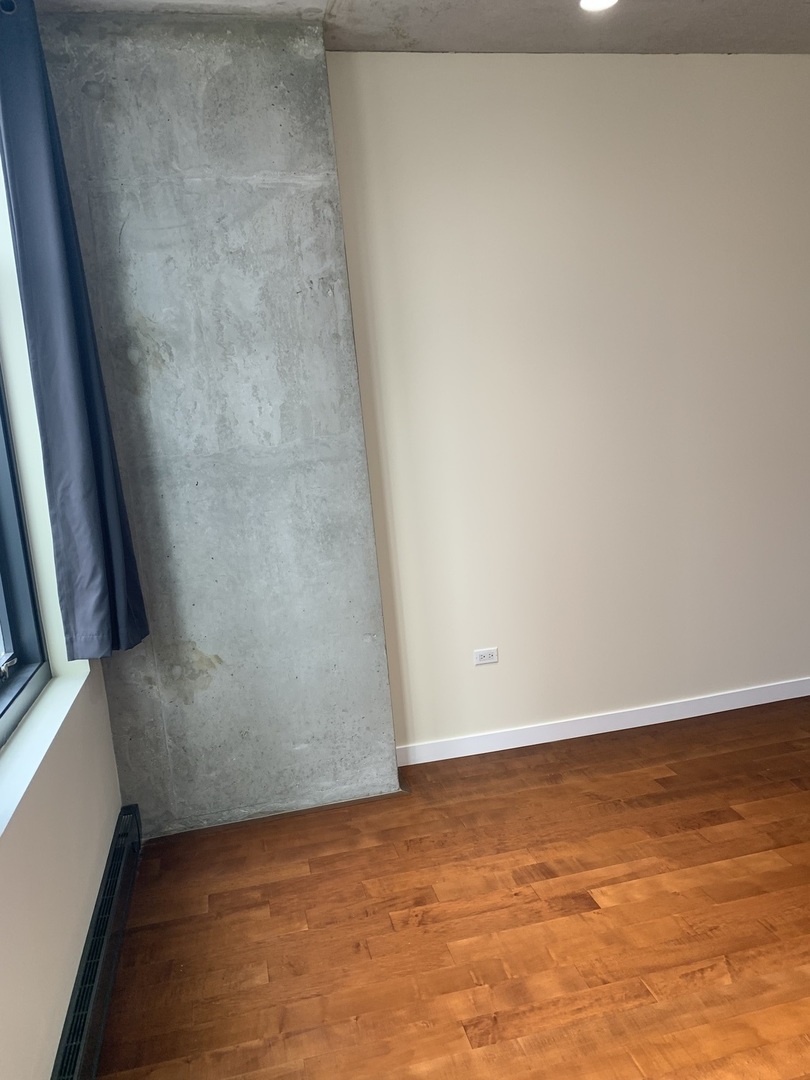 235 West Van Buren Street, Unit 3820 Chicago, IL 60607 - Photo 14 of 38 a view of room with window