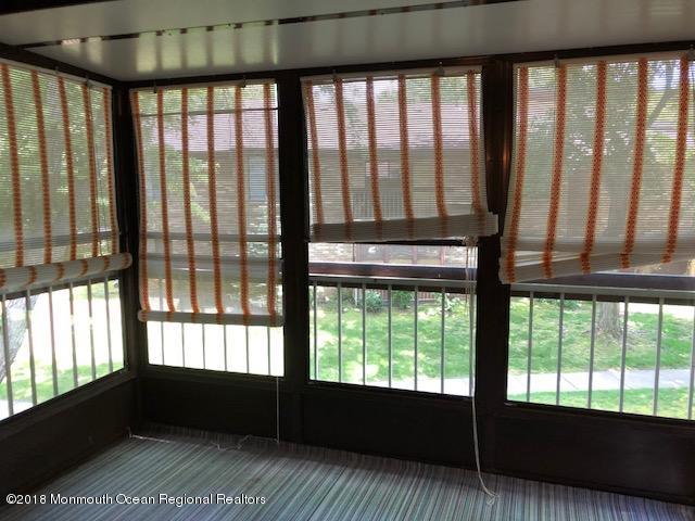 97 Arrowood Road, Unit K Manalapan, NJ 07726 - Photo 8 of 10 Enclosed Sunroom for relaxation