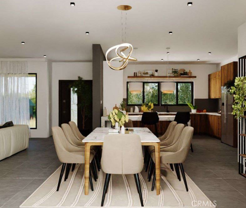 7032 Saddleback Road Joshua Tree, CA 92252 - Photo 4 of 40 a view of a dining room with furniture window and wooden floor