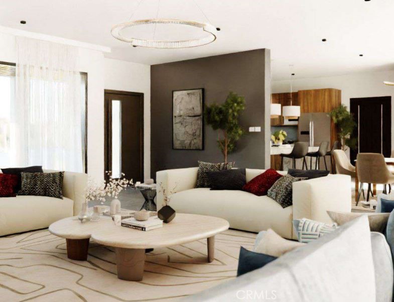 7032 Saddleback Road Joshua Tree, CA 92252 - Photo 6 of 40 a living room with furniture and a large window