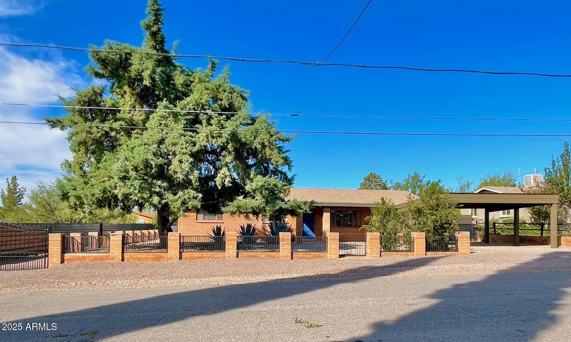 a view of a chairs and table in the patio