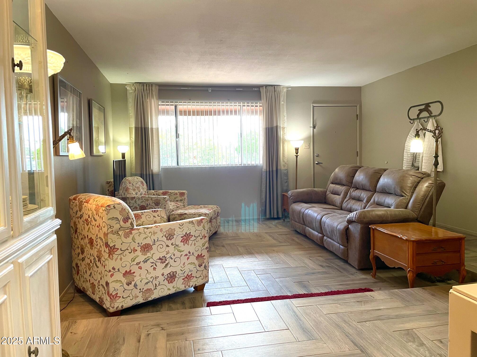 110 Nighthawk Avenue Bisbee, AZ 85603 - Photo 13 of 56 a living room with furniture and wooden floor