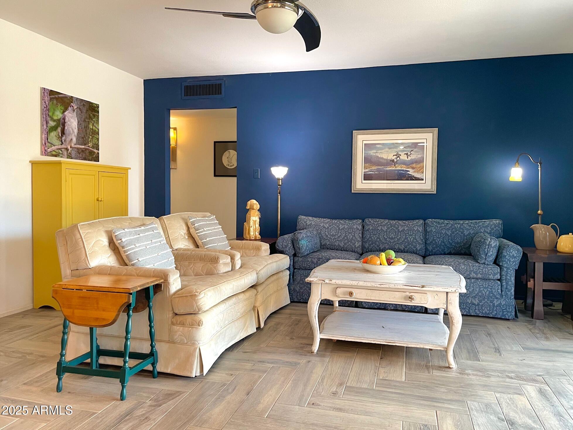 110 Nighthawk Avenue Bisbee, AZ 85603 - Photo 20 of 56 a living room with furniture and wooden floor