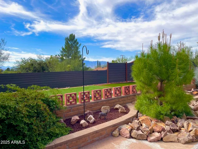 a view of a street with a building in the background