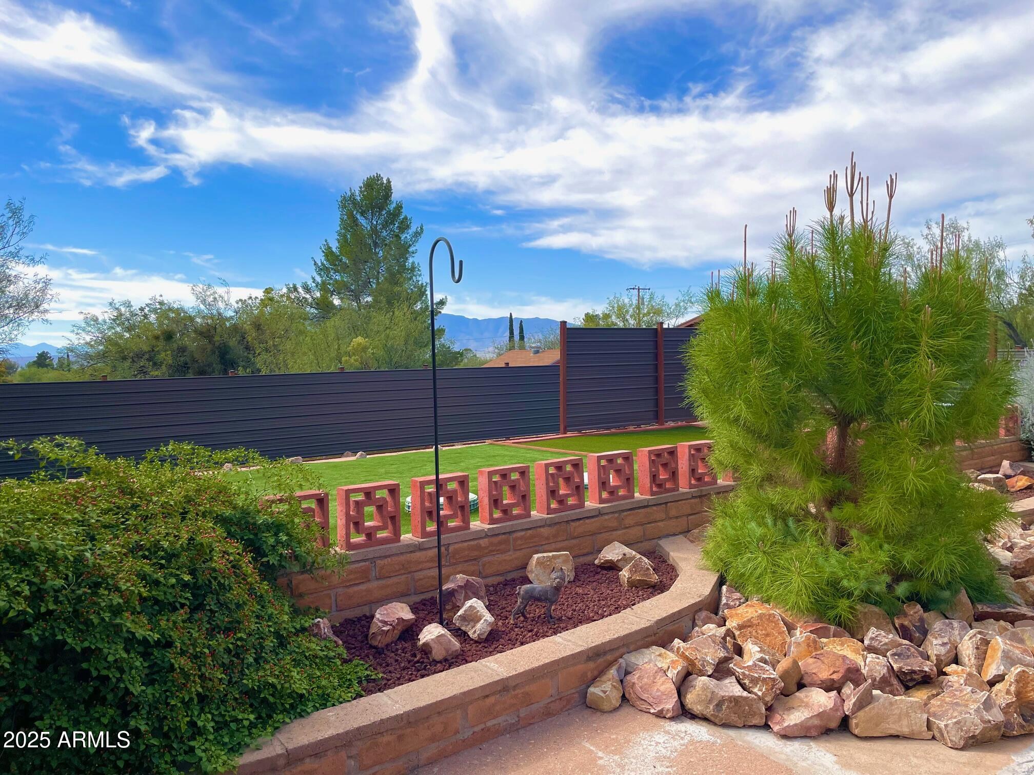 110 Nighthawk Avenue Bisbee, AZ 85603 - Photo 39 of 56 a view of a street with a tree in the background