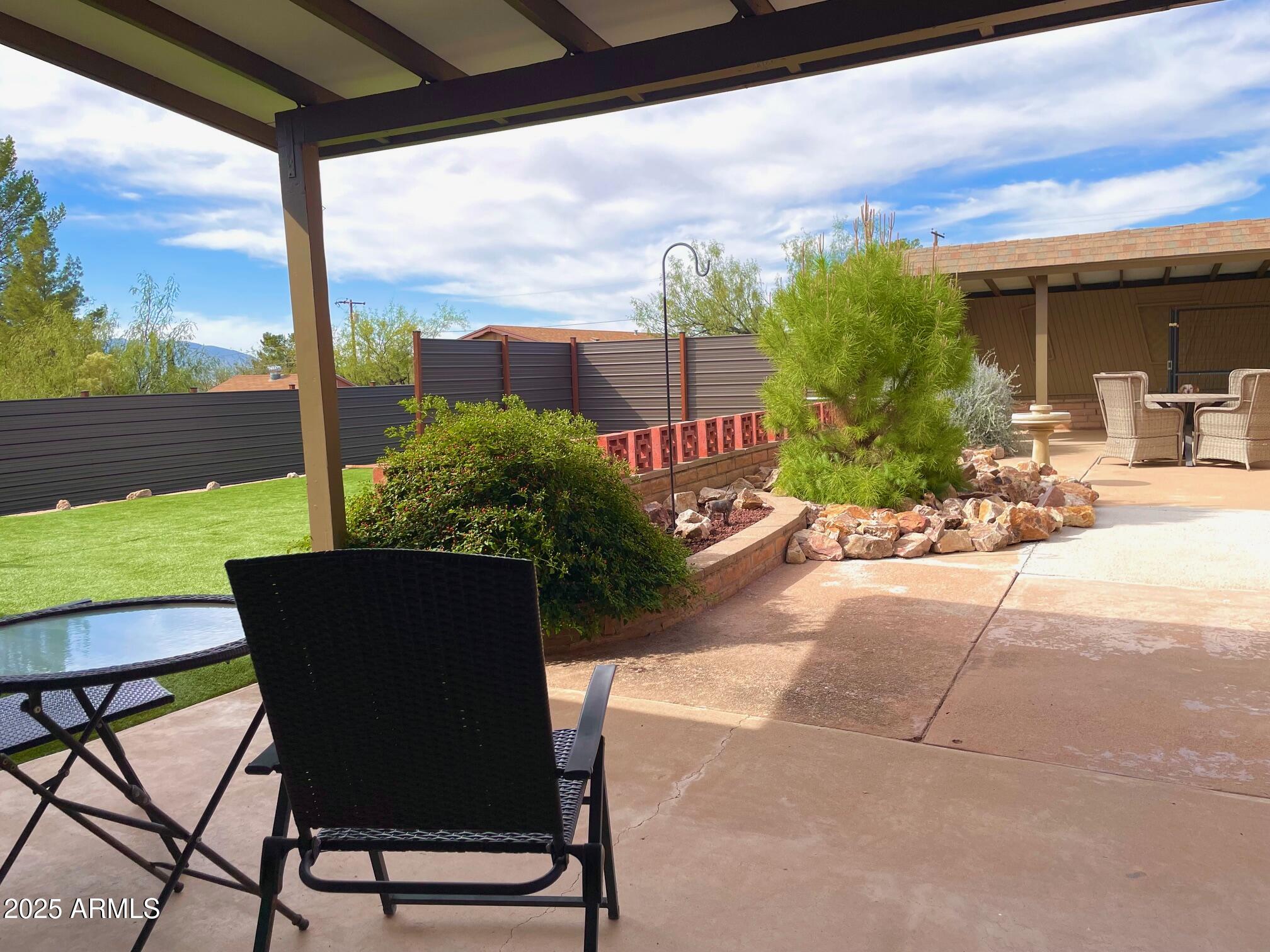 110 Nighthawk Avenue Bisbee, AZ 85603 - Photo 40 of 56 a view of a chairs and table in patio