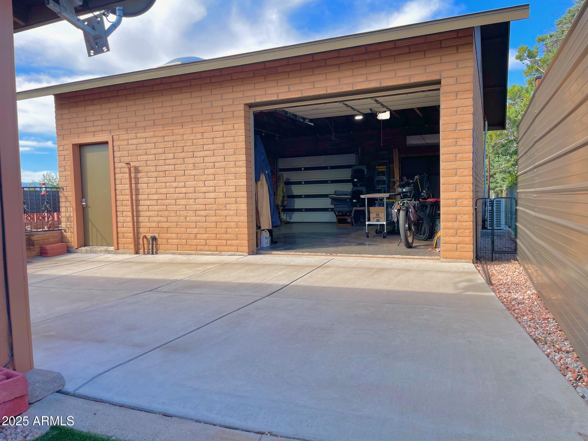110 Nighthawk Avenue Bisbee, AZ 85603 - Photo 47 of 56 a view of empty room with desk and a chandelier