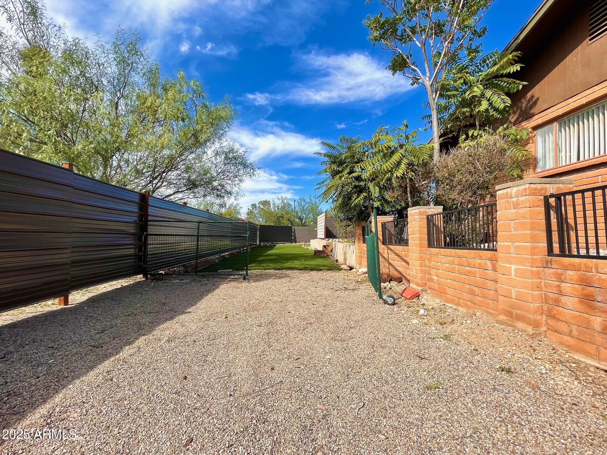110 Nighthawk Avenue Bisbee, AZ 85603 - Photo 53 of 56 a view of a yard with plants and trees