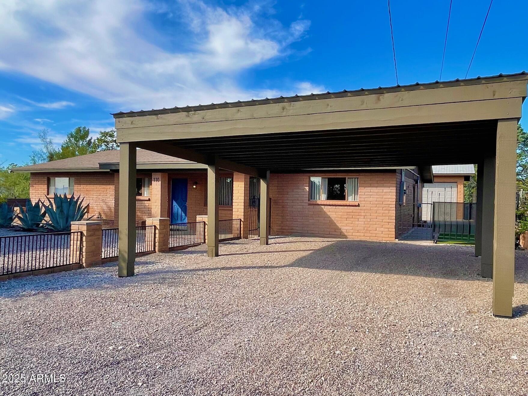 110 Nighthawk Avenue Bisbee, AZ 85603 - Photo 6 of 56 a front view of a house with a porch