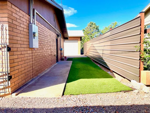 a view of a backyard with a garden