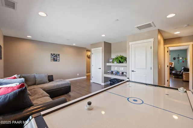 a front view of a house with parking area