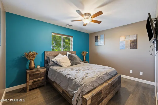 a view of swimming pool with seating area