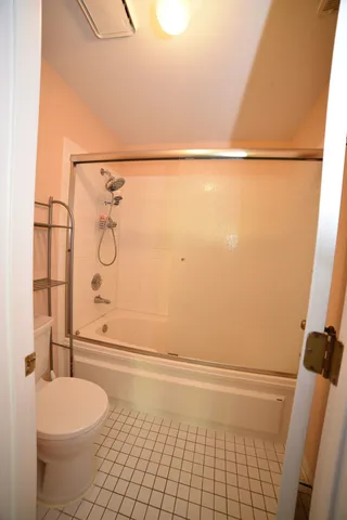 a bathroom with a double vanity sink mirror and double