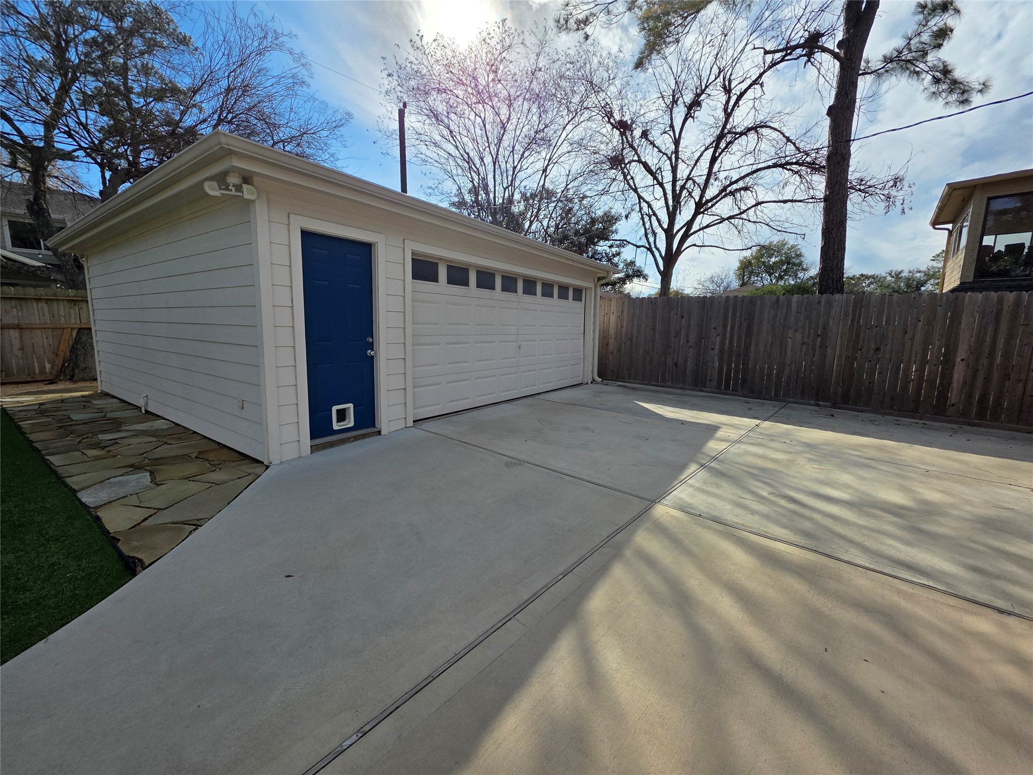 11219 Valley Spring Drive Houston, TX 77043 - Photo 22 of 31 Spacious garage and a paved driveway
