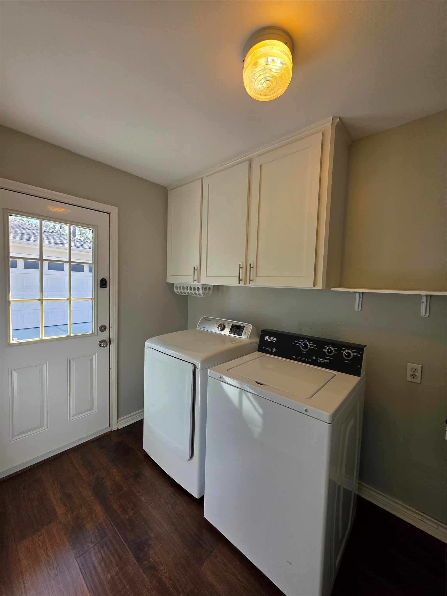 11219 Valley Spring Drive Houston, TX 77043 - Photo 28 of 31 Laundry room with cabinet space. W/D included