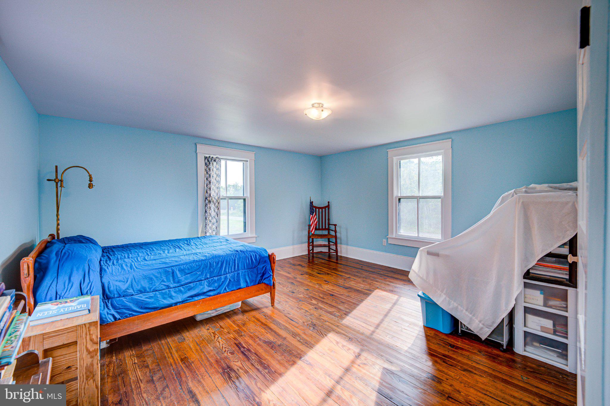 24177 Rapidan Road Mitchells, VA 22729 - Photo 22 of 43 Bright and airy blue bedroom retreat.
