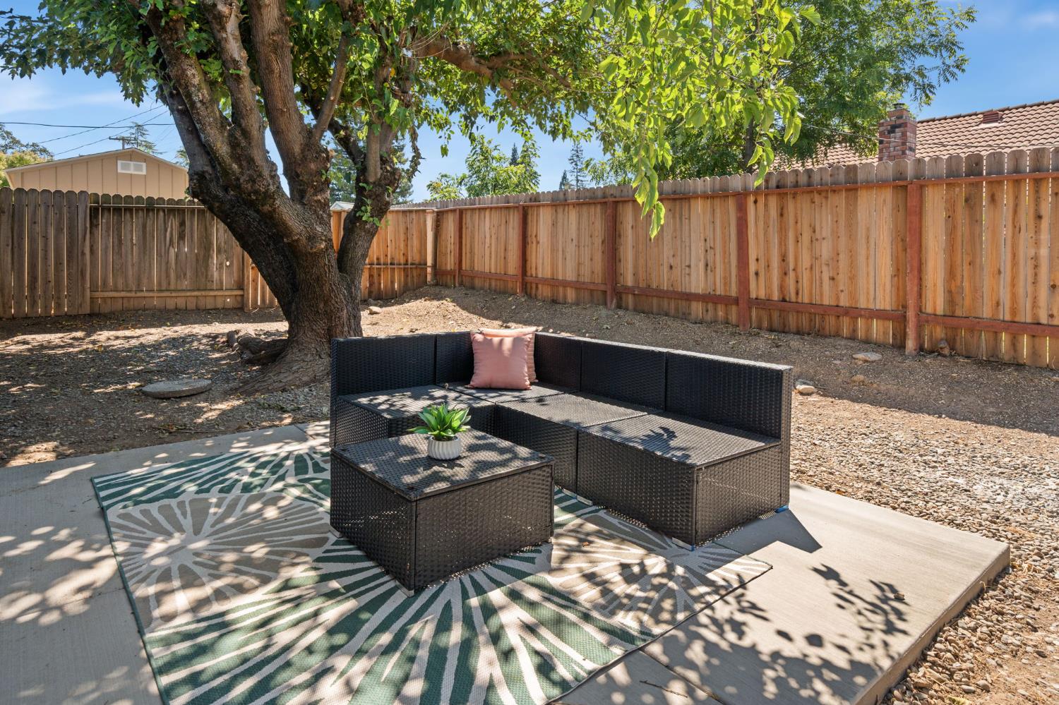 1902 Wildwood Way Roseville, CA 95661 - Photo 21 of 22 a living room with furniture and a outdoor space