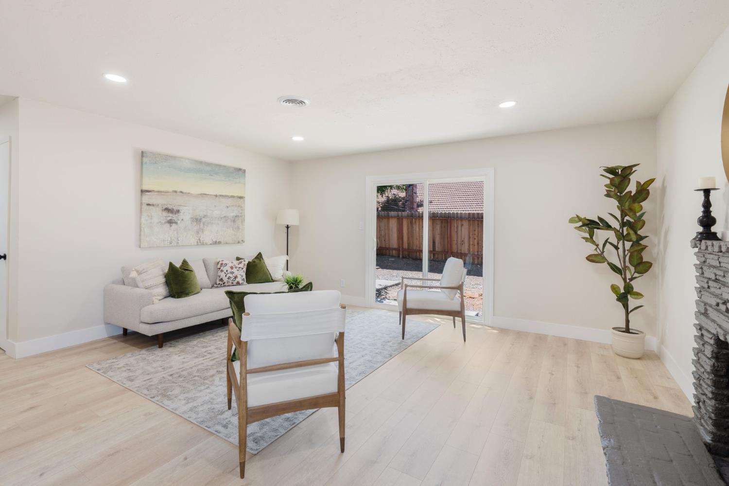 1902 Wildwood Way Roseville, CA 95661 - Photo 4 of 22 a living room with furniture and a potted plant
