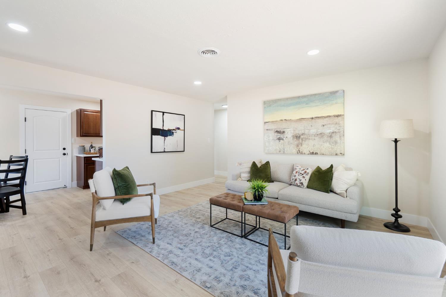 1902 Wildwood Way Roseville, CA 95661 - Photo 5 of 22 a living room with furniture and wooden floor