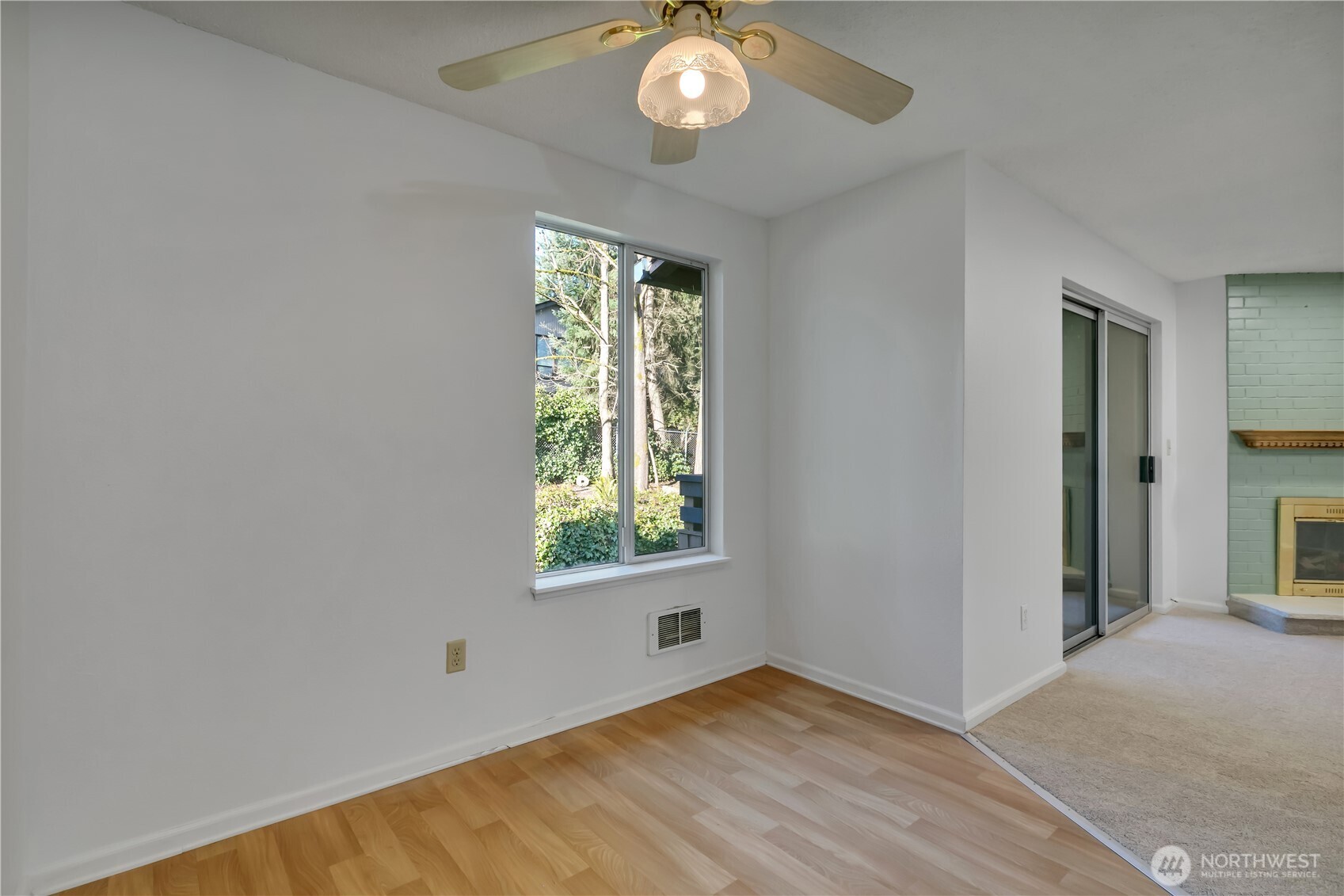 17527 149th Avenue Southeast, Unit B12 Renton, WA 98058 - Photo 11 of 27 an empty room with a window