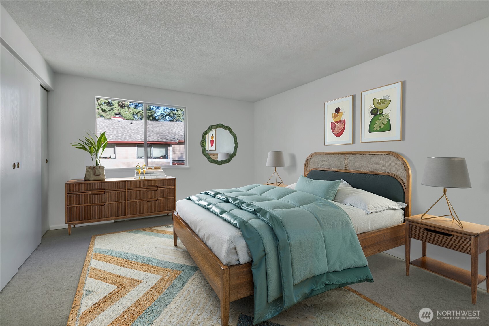 17527 149th Avenue Southeast, Unit B12 Renton, WA 98058 - Photo 15 of 27 a bedroom with a bed and a dresser