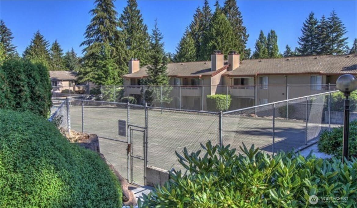 17527 149th Avenue Southeast, Unit B12 Renton, WA 98058 - Photo 27 of 27 a view of a house with backyard