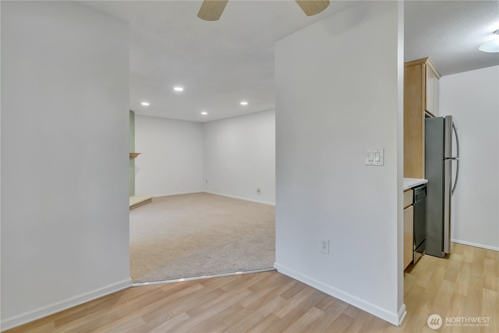 17527 149th Avenue Southeast, Unit B12 Renton, WA 98058 - Photo 10 of 27 a view of a room with wooden floor