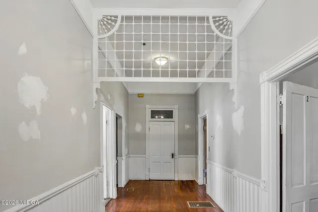 a view of bathroom with a shower and a sink