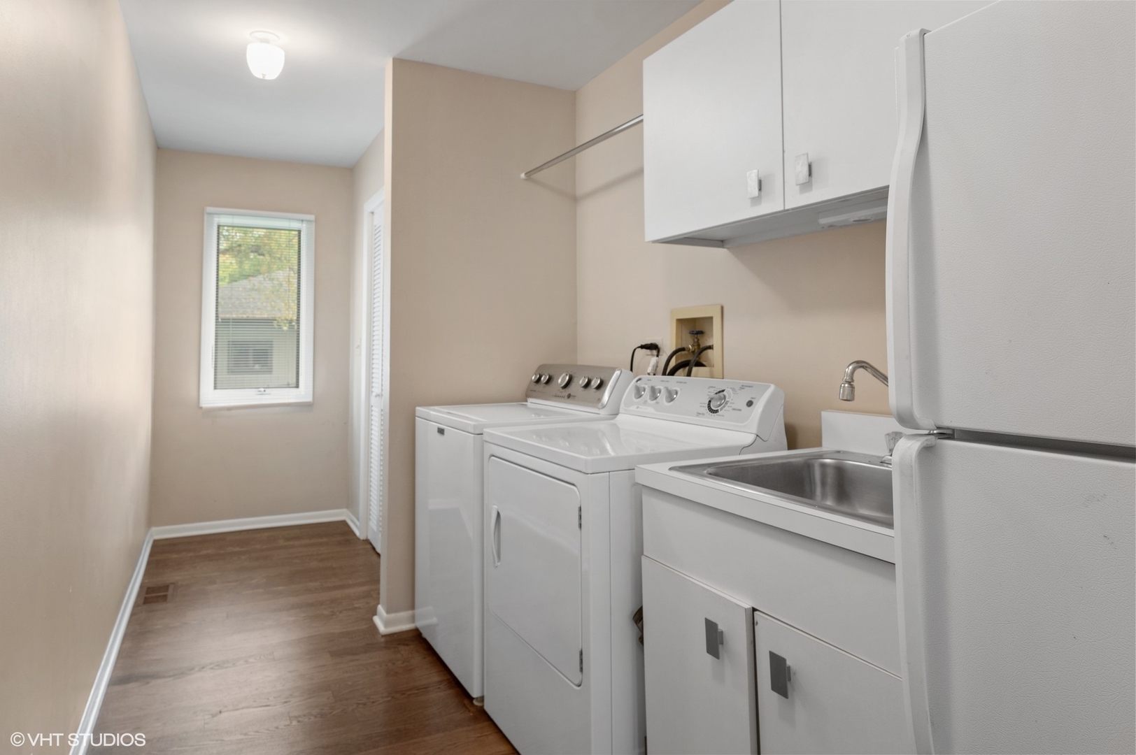 63 Overlook Drive Golf, IL 60029 - Photo 15 of 32 a utility room with sink dryer and washer